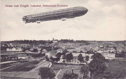 1909, Gruss vom Erzgeb. Volksfest, Hohenstein-Ernstthal, Zeppelin beschriftet mit: "Friedrichshafen-Berlin über Hohenstein-Ernstthal"